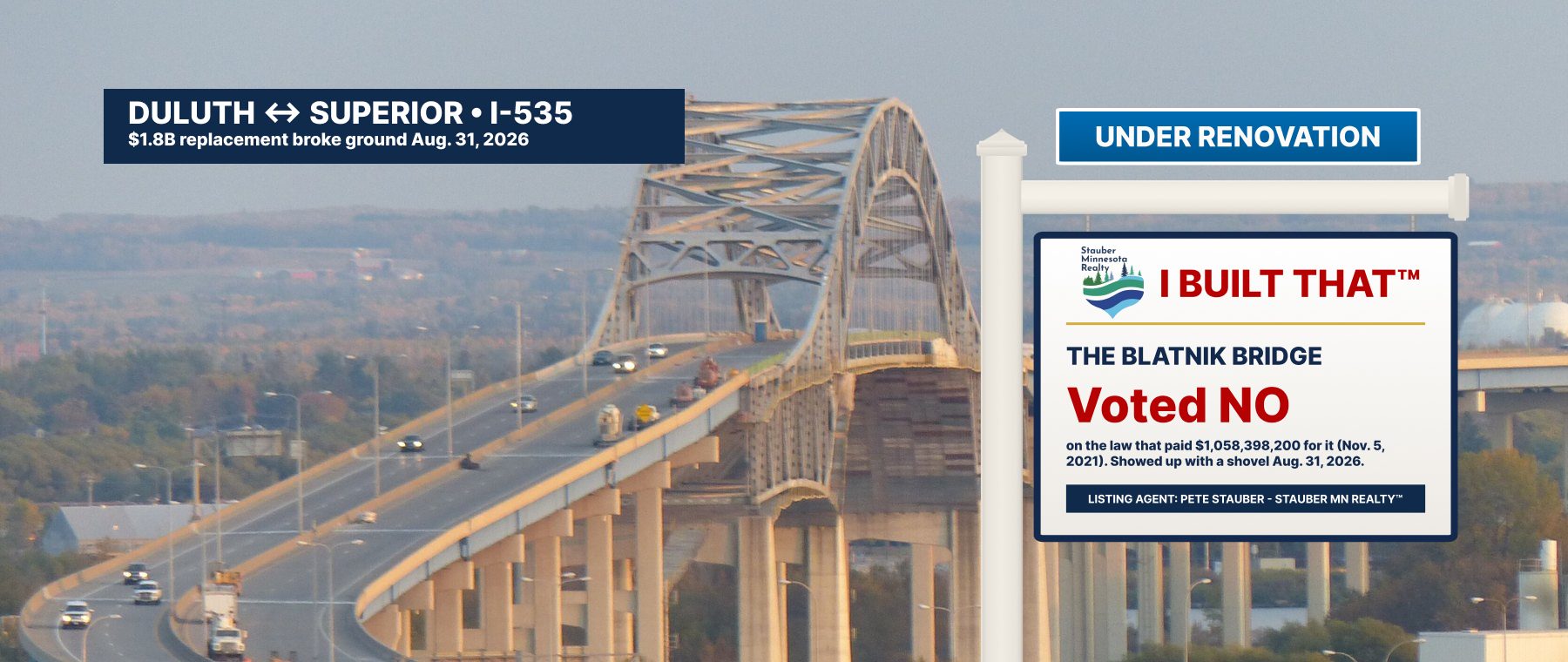 Photo of the Blatnik Bridge seen from Duluth with a Stauber Minnesota Realty sign: Duluth to Superior, I-535. I built that: the Blatnik Bridge. Voted no.